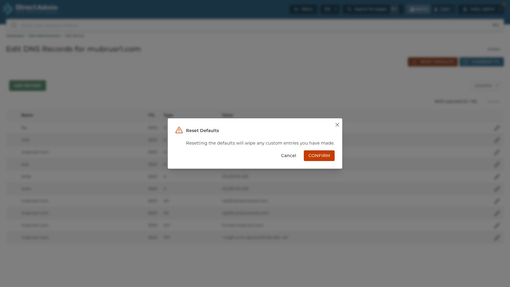 ภาพหน้าจอ confirmation Reset Defaults ใน DirectAdmin เตือนว่าจะ wipe custom entries พร้อมปุ่ม Cancel และ Confirm